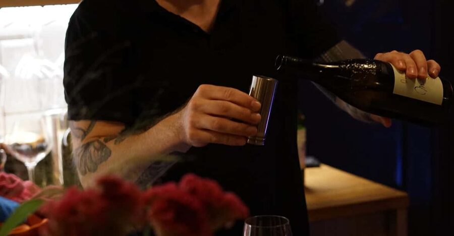 6-Tier Hungarian Wine Tasting at a Cozy Community Table - Price and Timing at $46