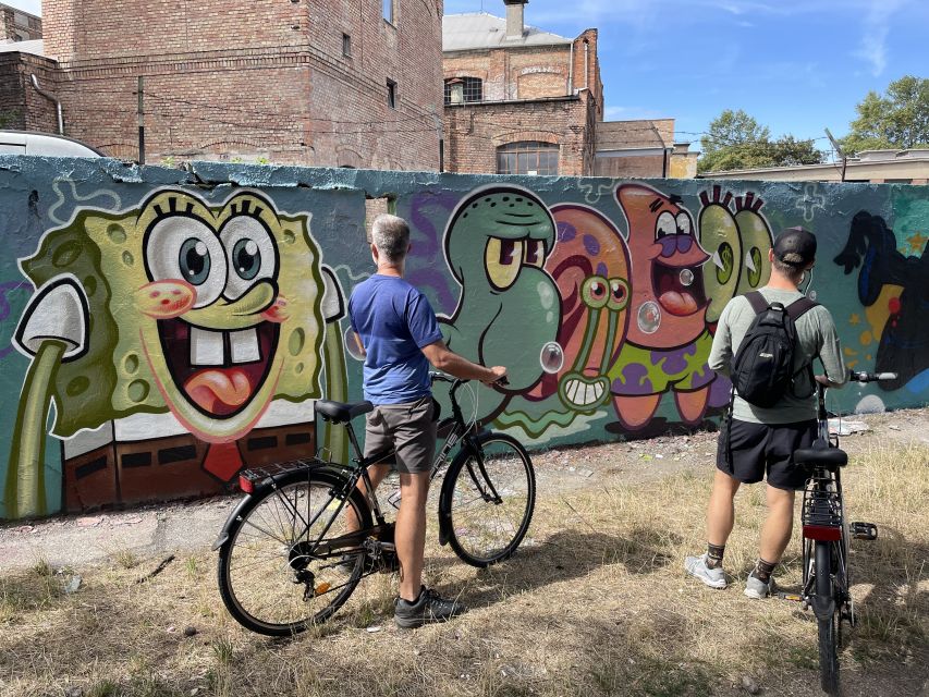 Alternative Bike tour: Graffiti Wall and Peace - A riverside pause with time to talk