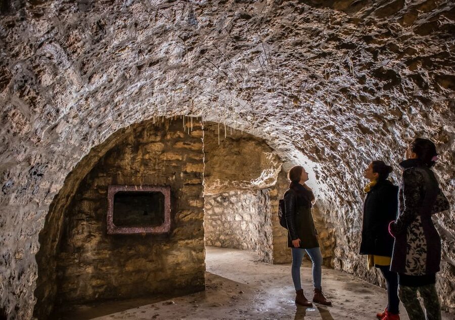 Budapest: Buda Castle Cave Tour - From medieval prison to wartime shelter