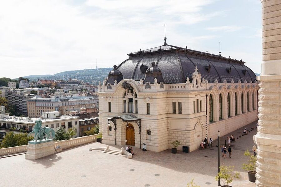 Budapest: Buda Castle Walking Tour & Folk Music Performance - Matthias Church and the first look at royal Buda