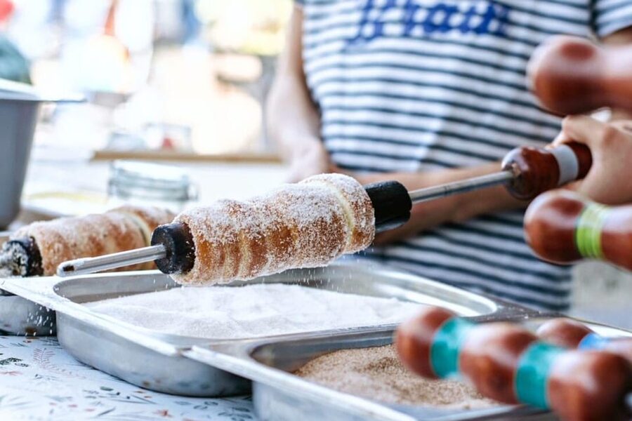 Budapest: Chimney Cake Workshop in City Park - Sitting down with your own kürtőskalács
