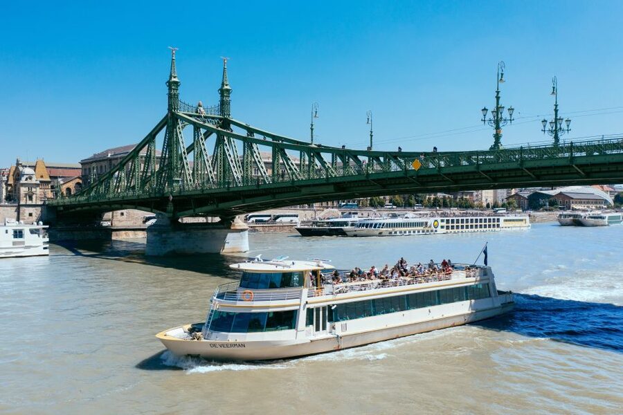Budapest: Day or Night River Cruise on Panoramic Boat - Returning past universities and the Central Market Hall