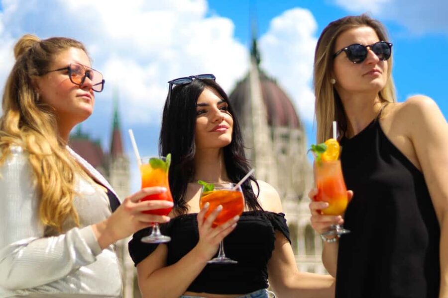 Budapest: Downtown Budapest Cocktail Cruise - Budapest at sunset, cocktail in hand