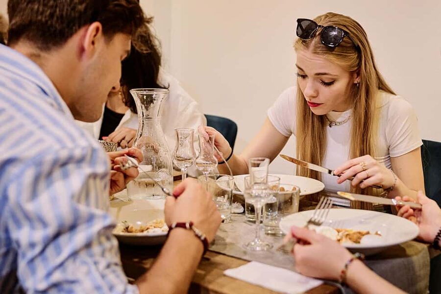Budapest Guided Food Tour with Drinks Included - Moving from street stalls to sit-down Hungarian dishes
