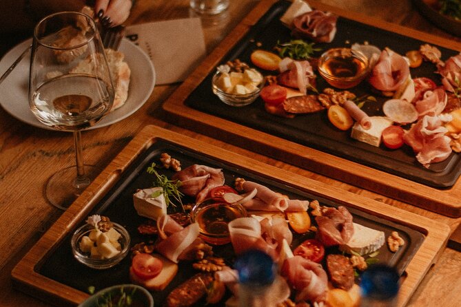 Food and Wine Tasting in Budapest City Center with Sommelier - Hungarian tapas, cheese, spreads, and dessert