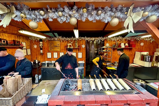 Private Budapest Christmas Market Tour with Chimney Cake & Mulled Wine - Gresham Palace and the city between the stops