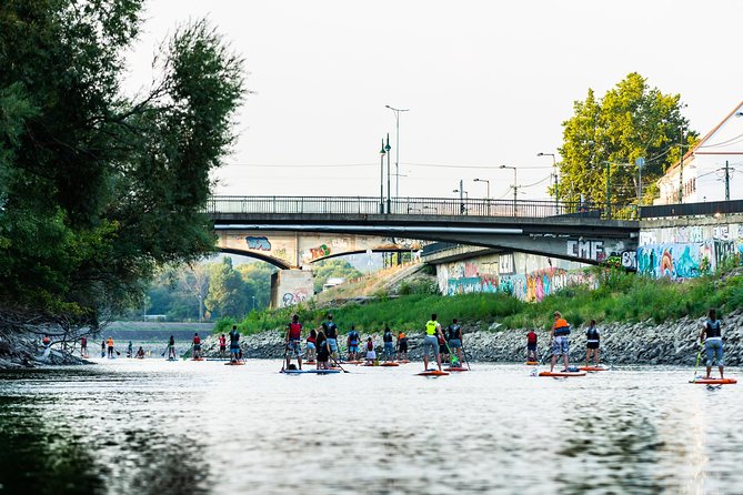 Sunrise SUP to the heart of Budapest - What the small group and photo service add